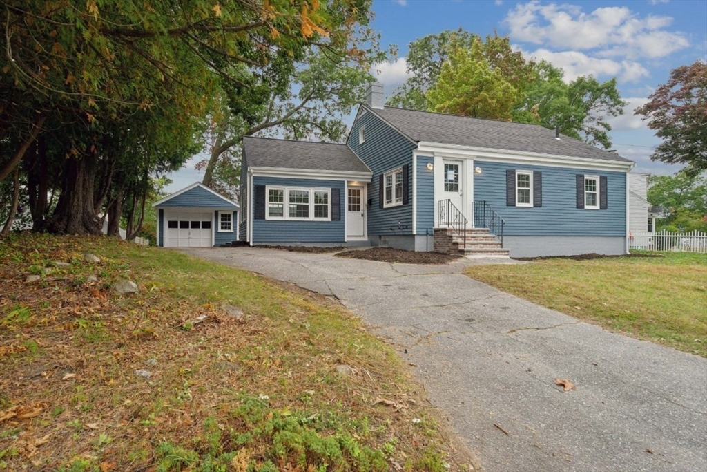 1 Arbor Road North Chelmsford, MA 01863 - Photo 38 of 40 front view of a house with a yard