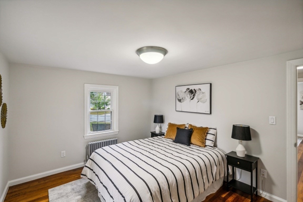 1 Arbor Road North Chelmsford, MA 01863 - Photo 4 of 40 a bedroom with a bed and a window