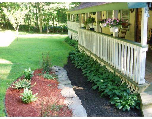 64 Searle Road Huntington, MA 01050 - Photo 5 of 13 a view of a porch and garden