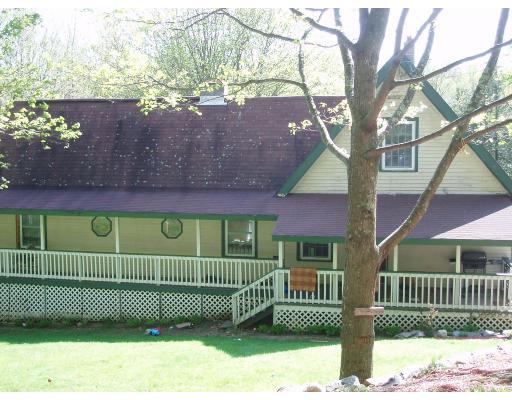64 Searle Road Huntington, MA 01050 - Photo 10 of 13 a front view of a house