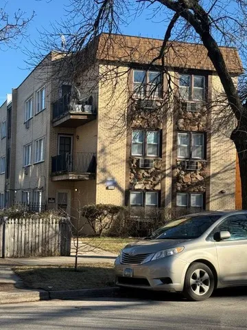 a car parked on the side of a street