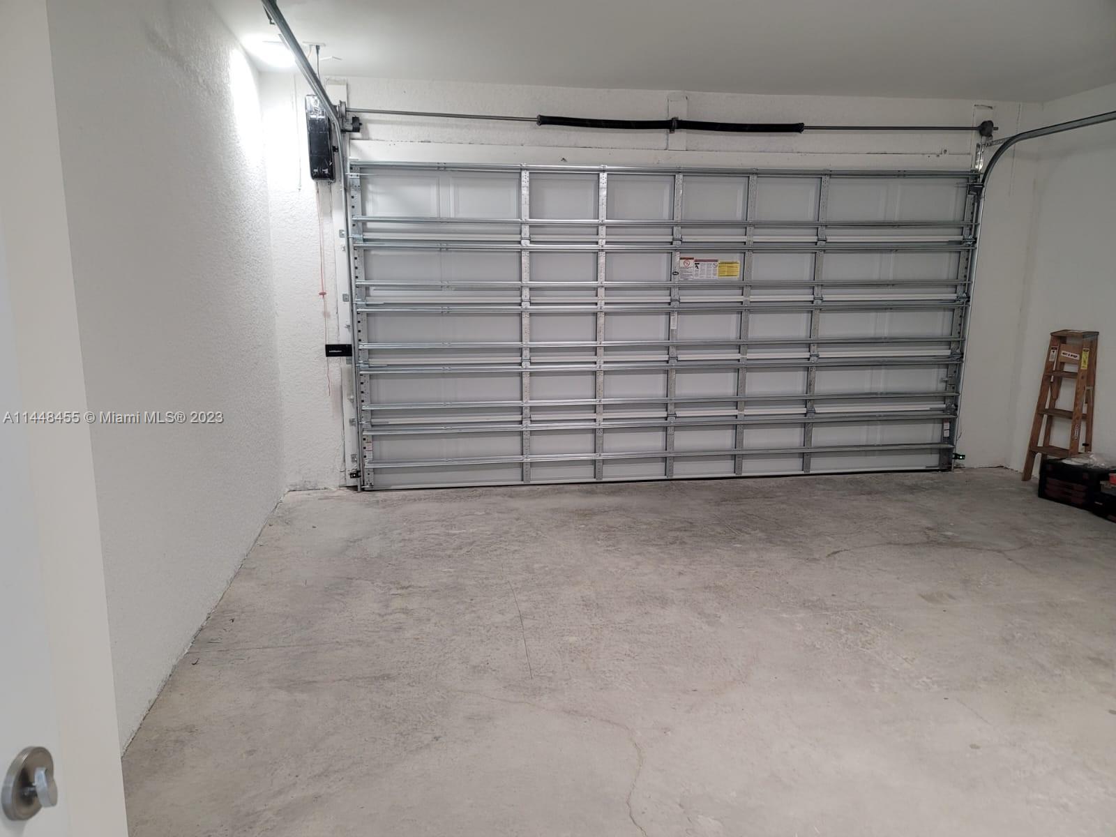 401 West 5th Street, Unit ST Lehigh Acres, FL 33972 - Photo 10 of 10 a view of a room with a walk in closet