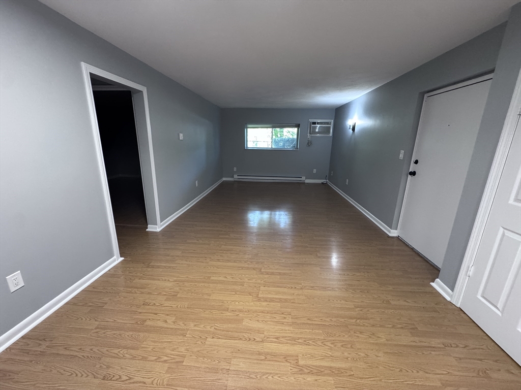 27 Gordon Street, Unit 108 Framingham, MA 01702 - Photo 2 of 11 a view of empty room with window