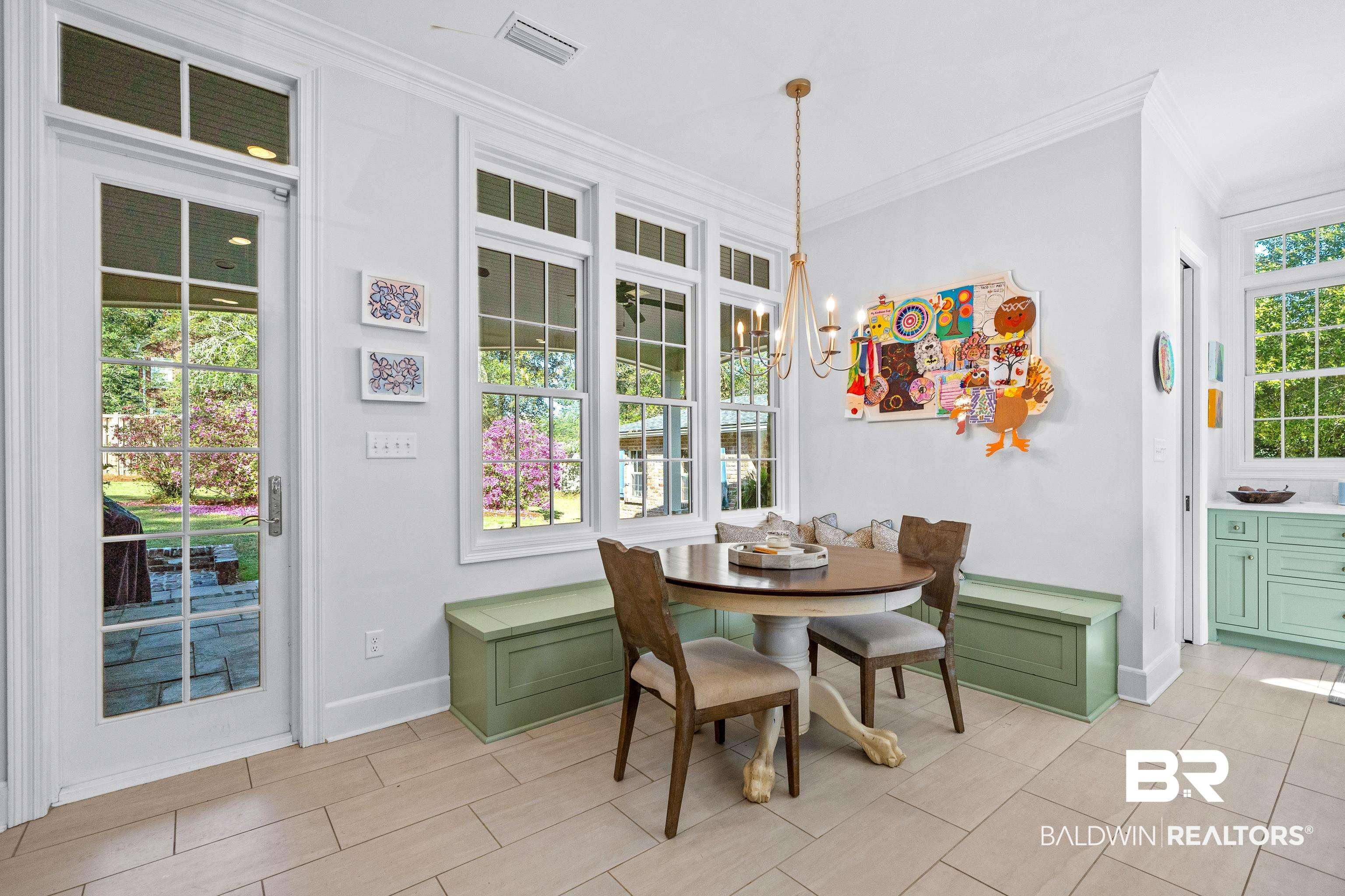141 Myrtlewood Lane Mobile, AL 36608 - Photo 13 of 44 Dining space featuring ornamental molding, baseboards, a chandelier, and visible vents