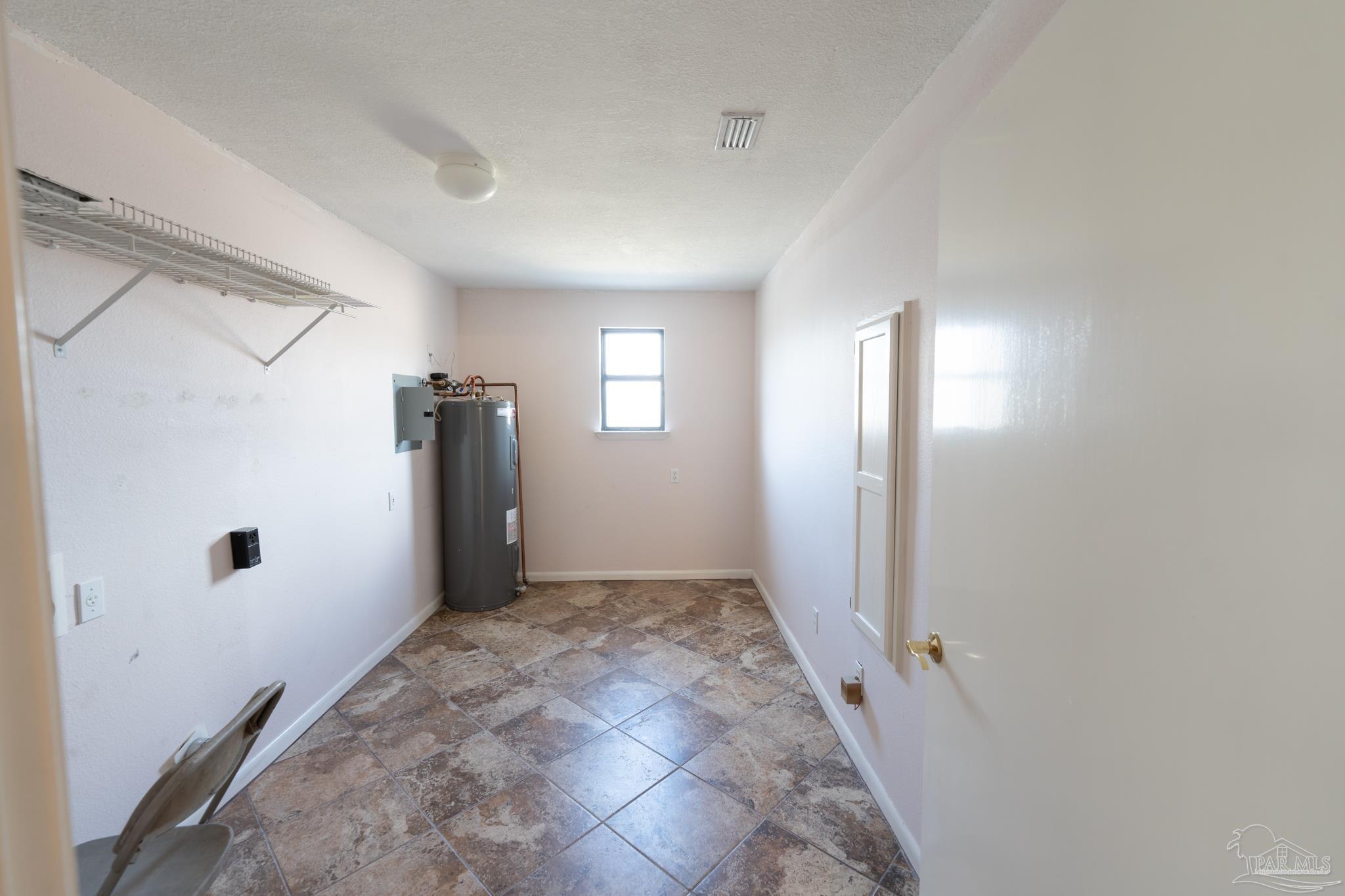 7608 River Road Milton, FL 32583 - Photo 23 of 28 a view of a hallway