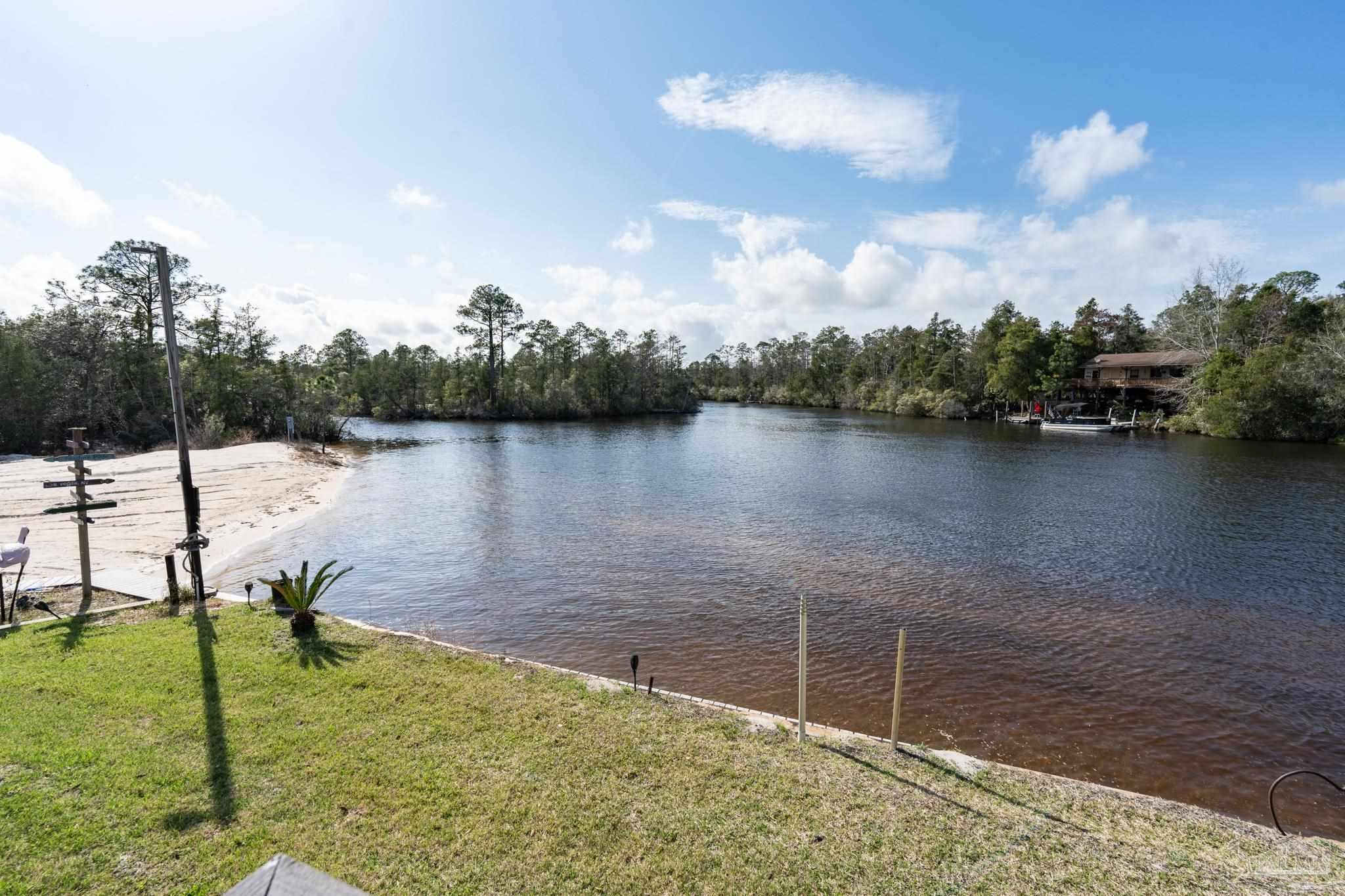 7608 River Road Milton, FL 32583 - Photo 26 of 28 a view of a lake