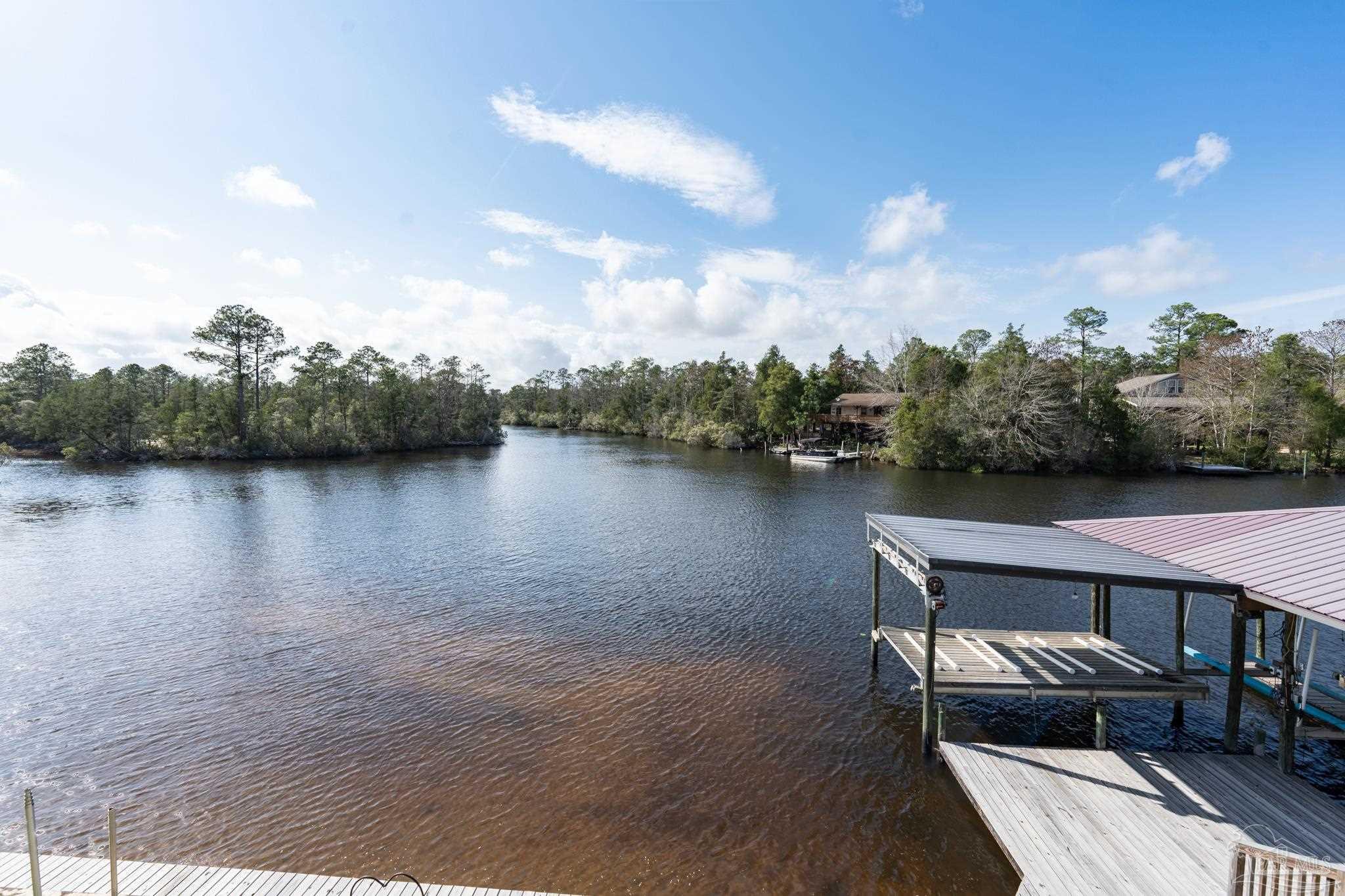 7608 River Road Milton, FL 32583 - Photo 27 of 28 a view of a terrace with sitting area