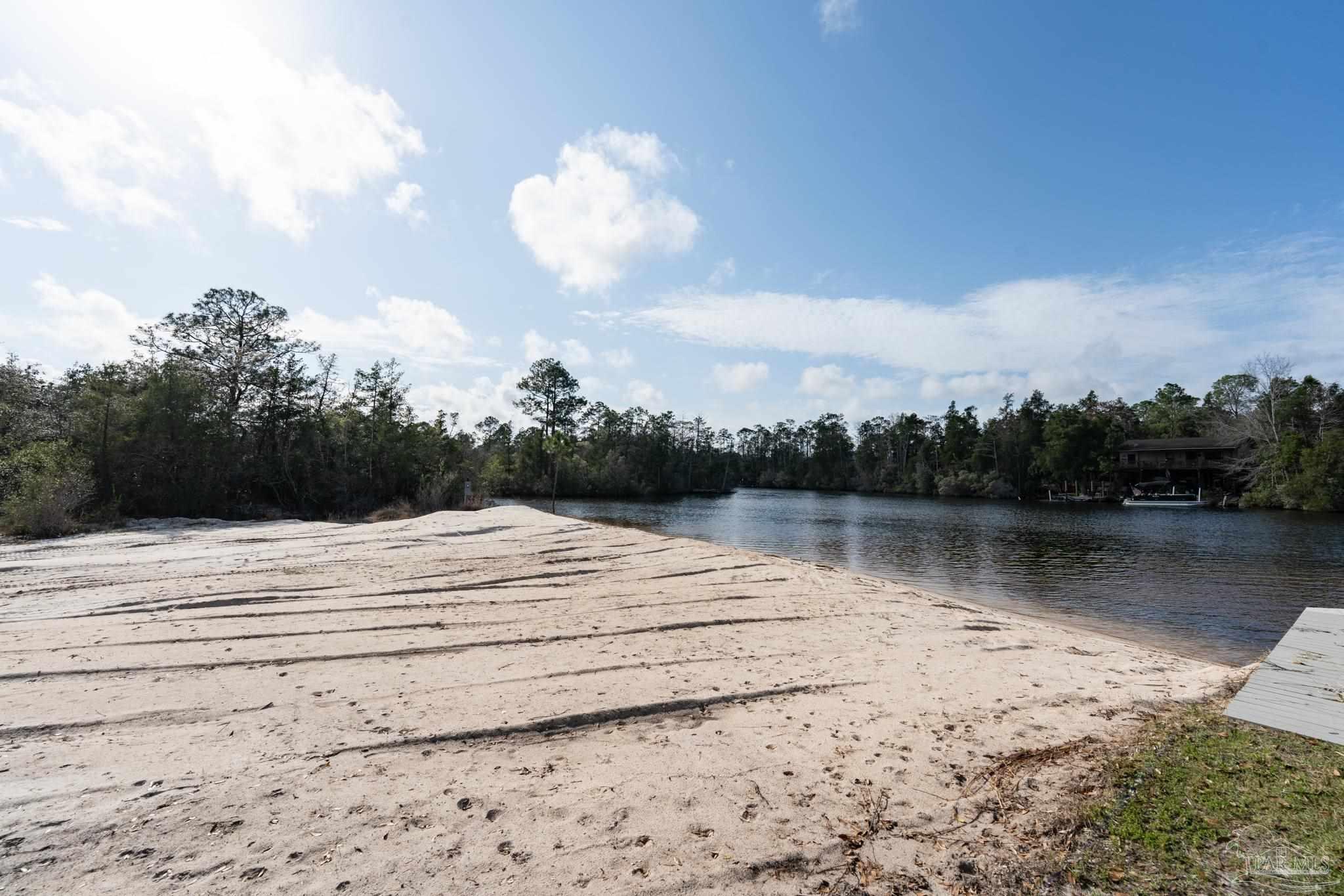 7608 River Road Milton, FL 32583 - Photo 10 of 28 a view of a lake