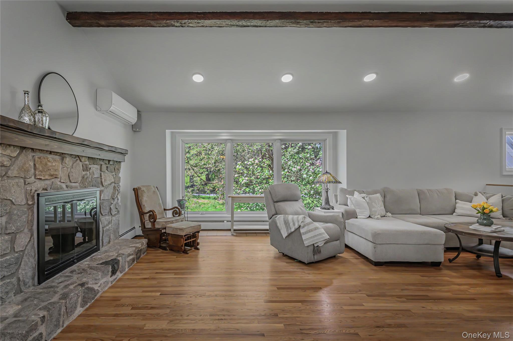41 Cross Pond Road Pound Ridge, NY 10576 - Photo 7 of 41 a living room with furniture and a fireplace