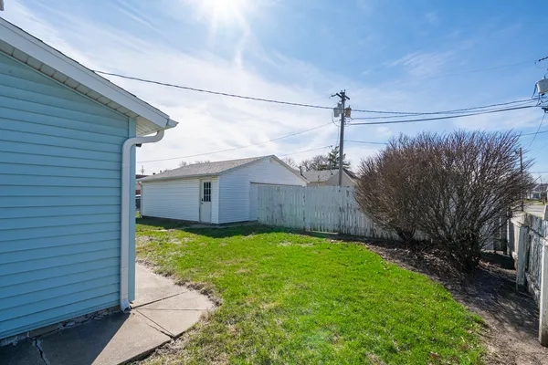 a view of a back yard of the house