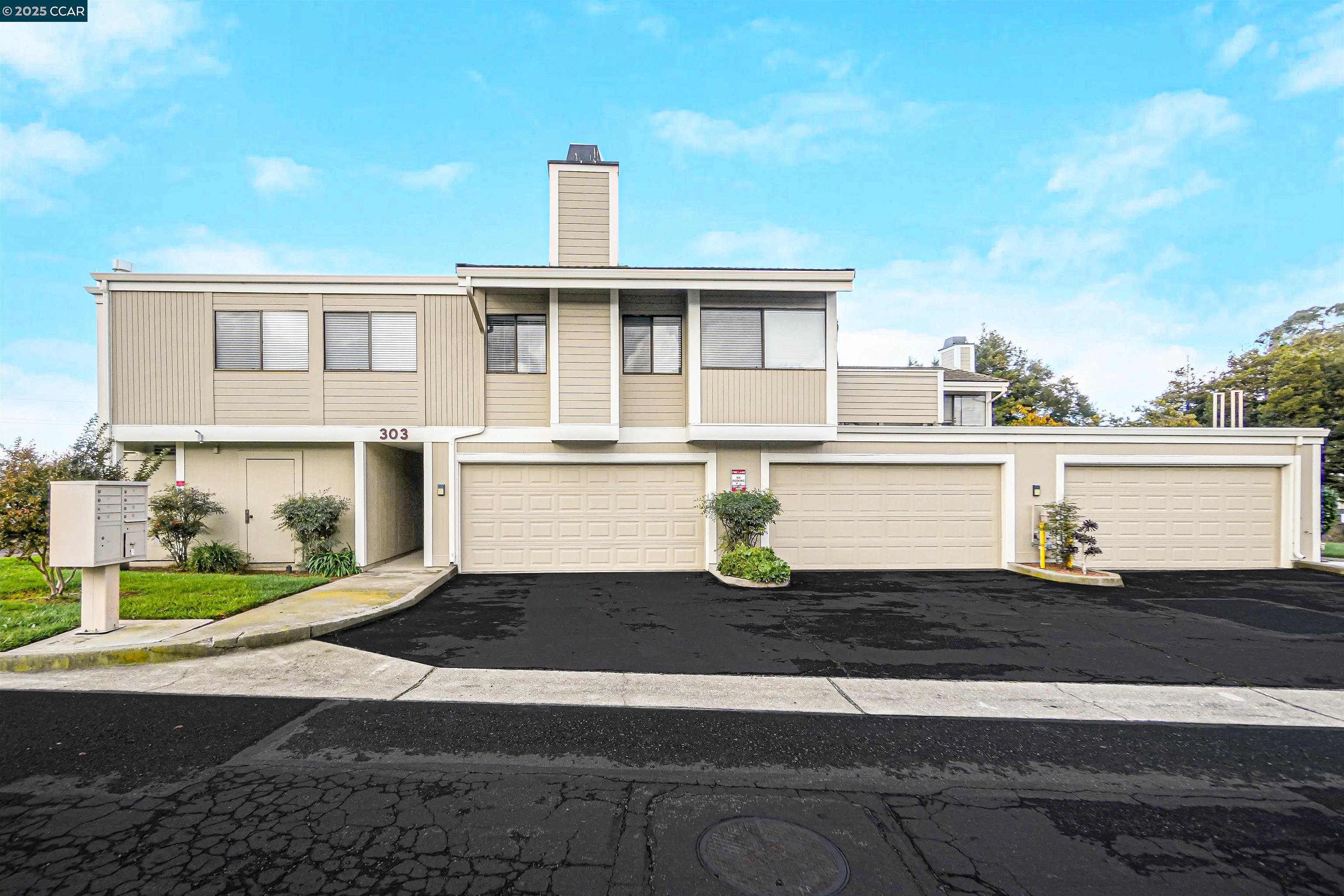 303 Atlas Drive, Unit 7 Hercules, CA 94547 - Photo 1 of 52 a front view of a house with a yard