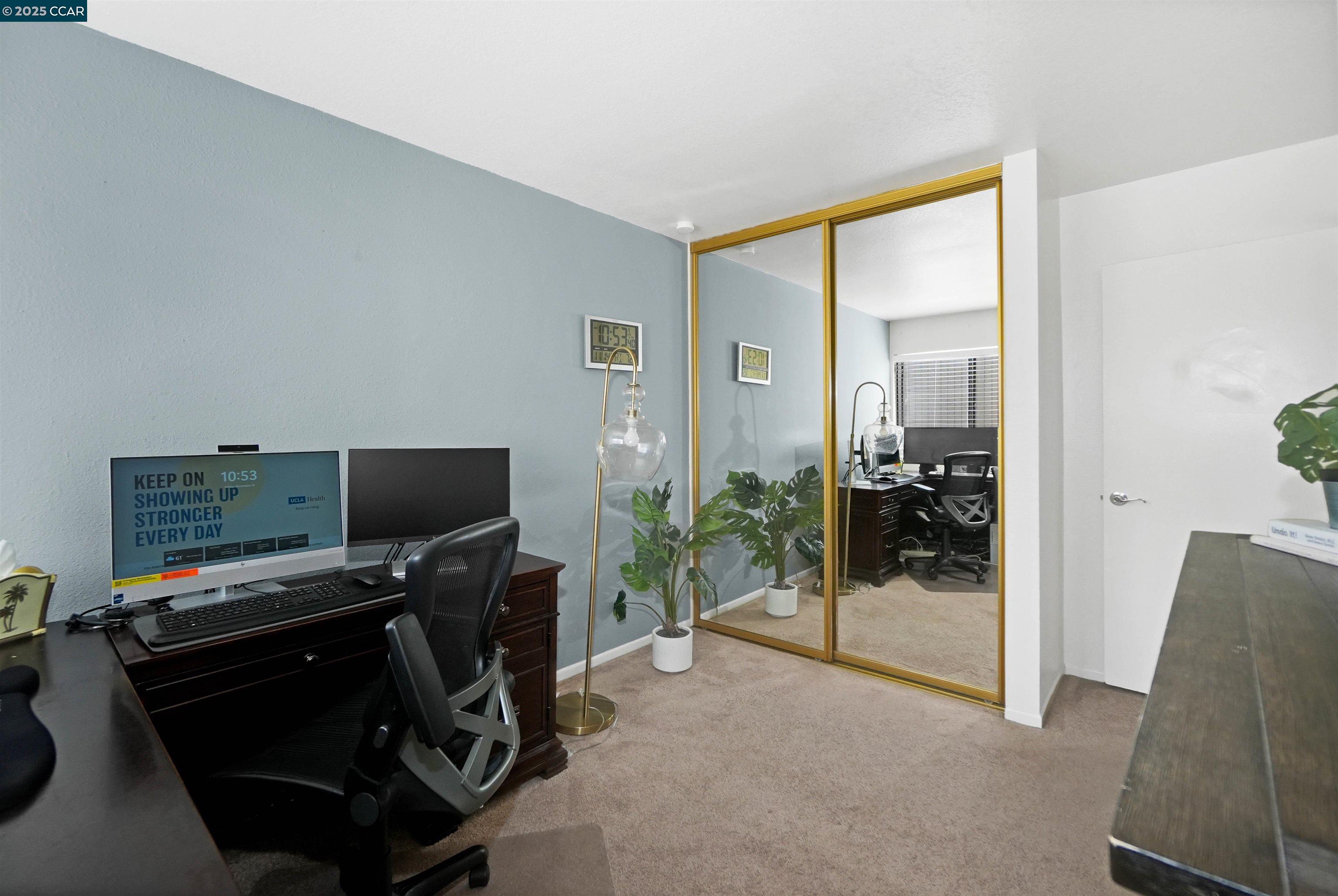 303 Atlas Drive, Unit 7 Hercules, CA 94547 - Photo 35 of 52 a view of a livingroom with a flat screen tv and a window