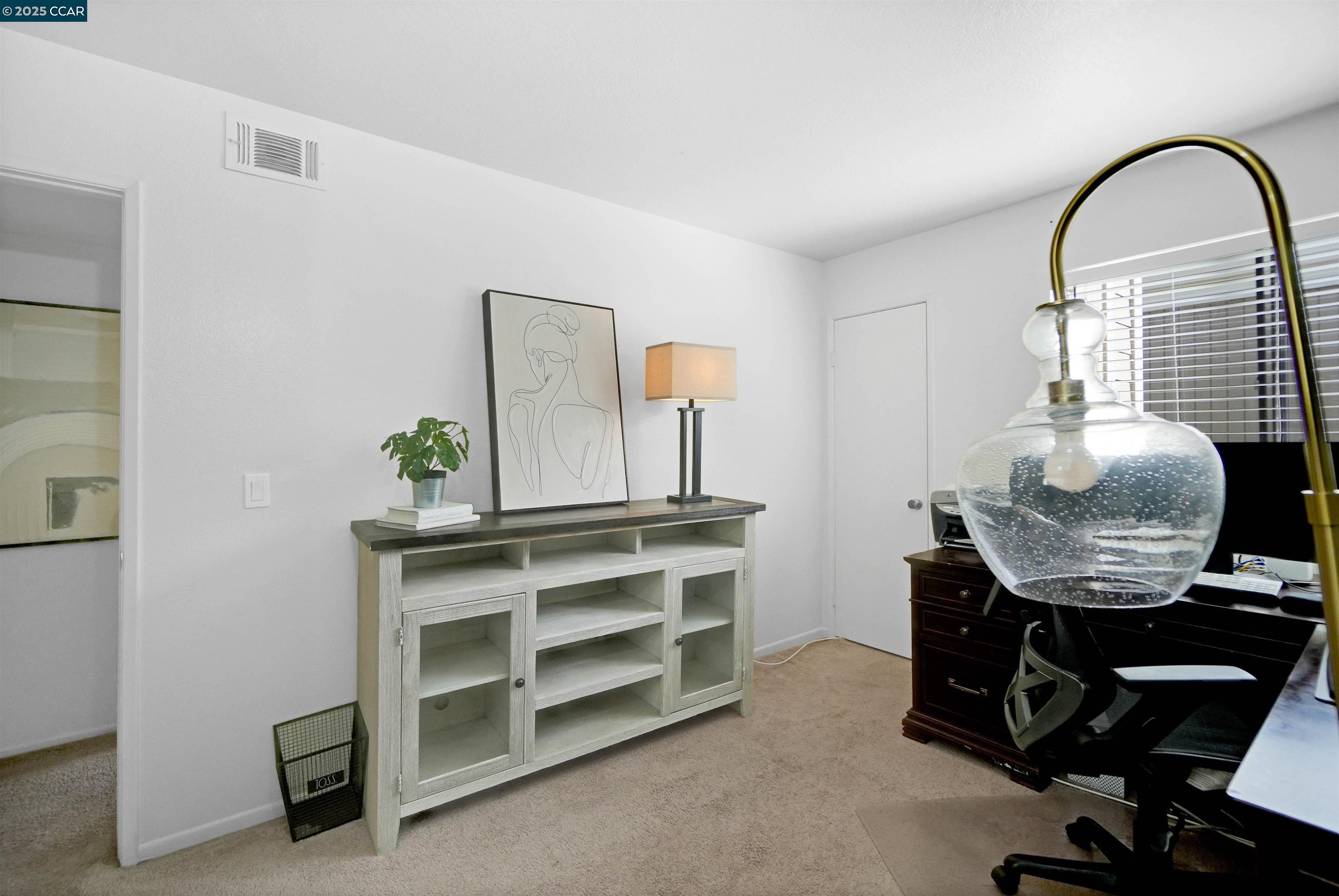 303 Atlas Drive, Unit 7 Hercules, CA 94547 - Photo 36 of 52 a room with furniture and a window