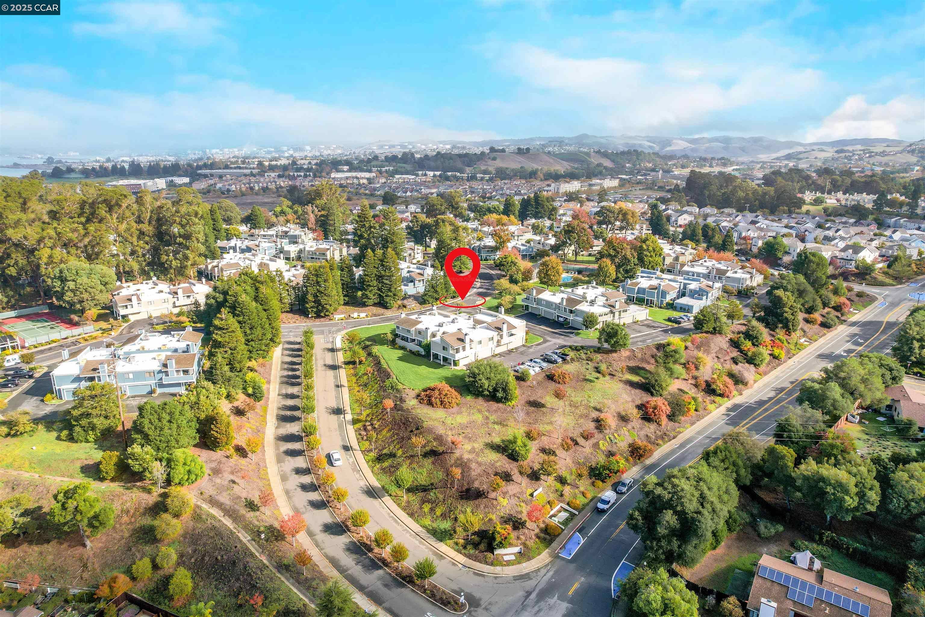 303 Atlas Drive, Unit 7 Hercules, CA 94547 - Photo 49 of 52 an aerial view of residential houses with outdoor space