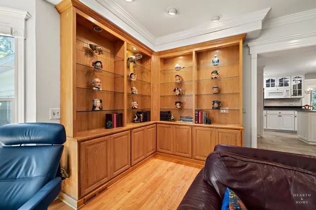 a kitchen with white cabinets appliances and a sink