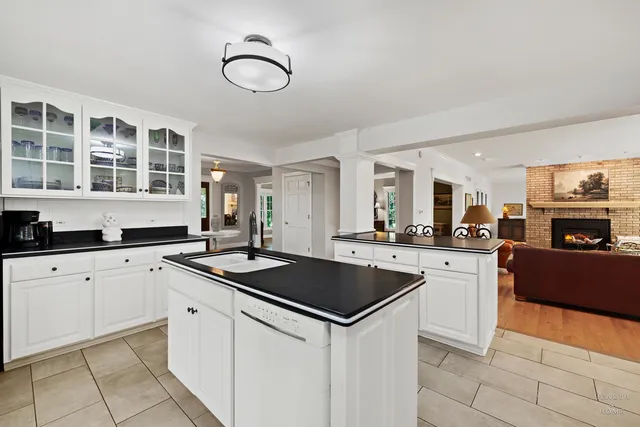 a kitchen with a cabinets and appliances