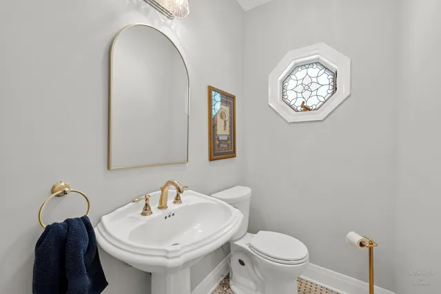 a spacious bedroom with a bed and a window