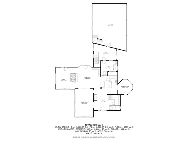 a view of a house with backyard and garden