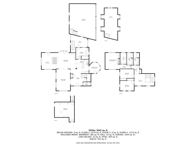 a big white house with a yard and large trees