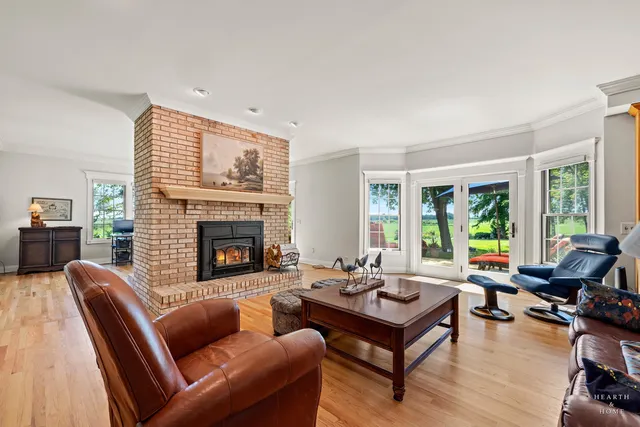 a view of a backyard with sitting area