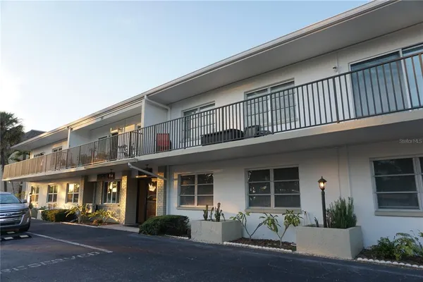 a front view of a building with street view