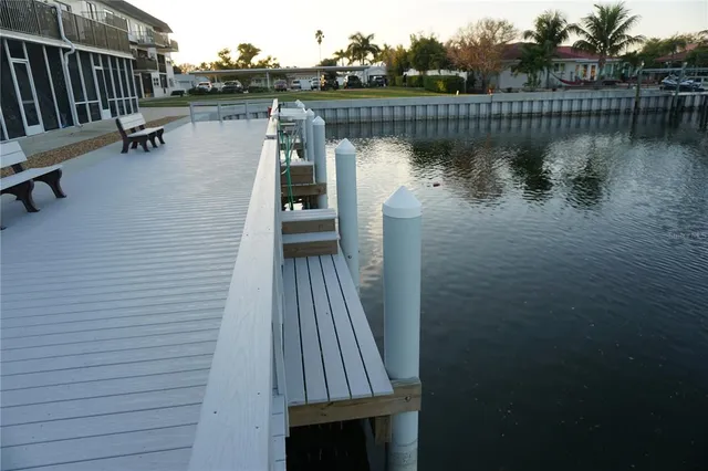 a front view of a building with glass windows and door