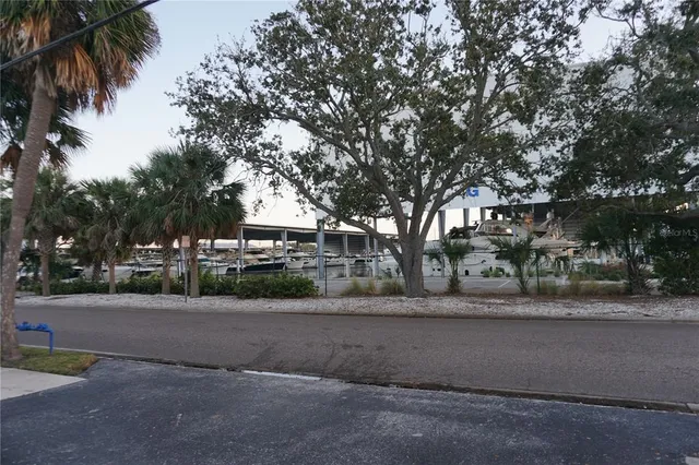 a view of road with a houses