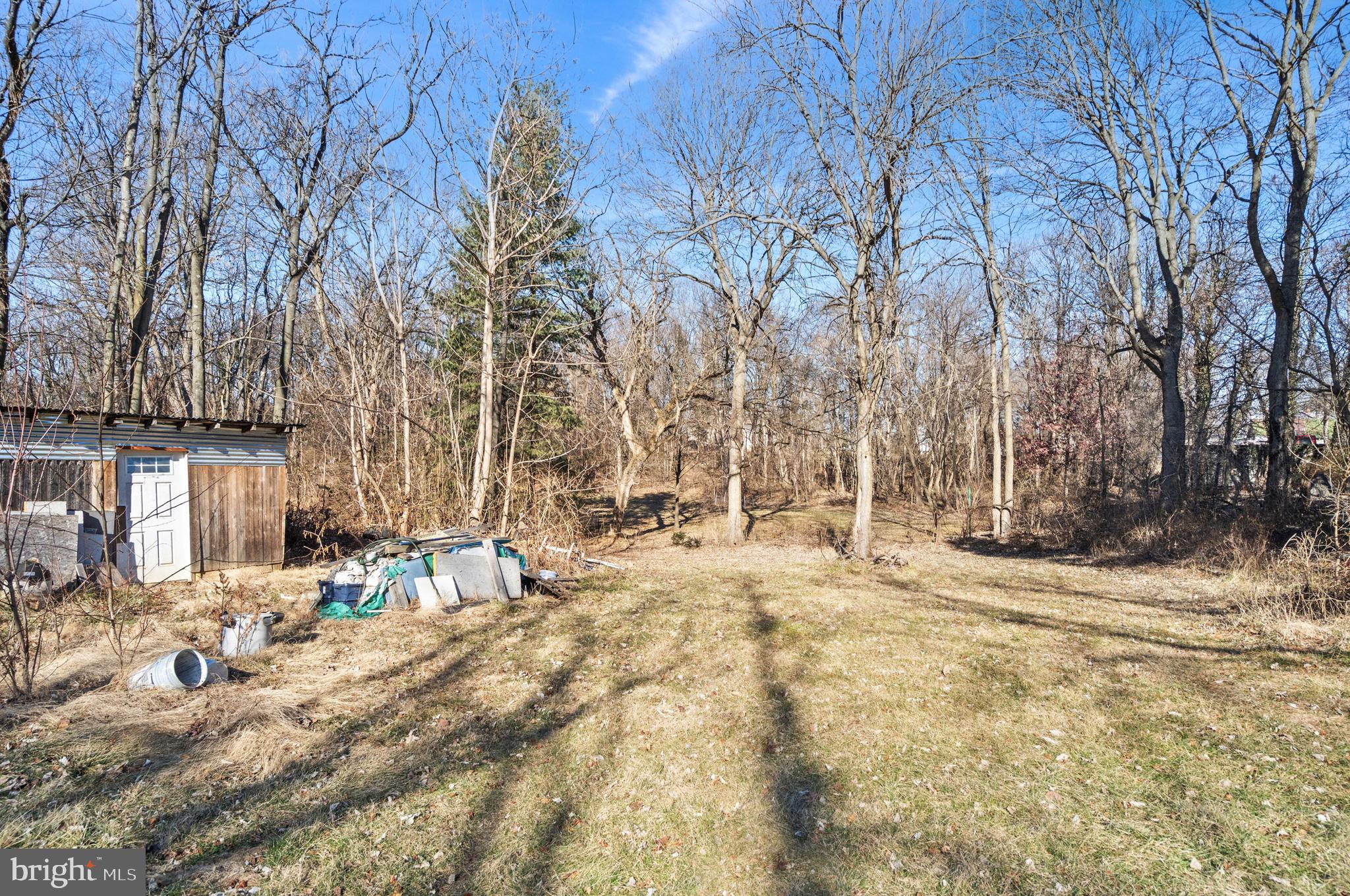 5664 Charles Town Road Kearneysville, WV 25430 - Photo 6 of 8 a view of a yard covered in snow