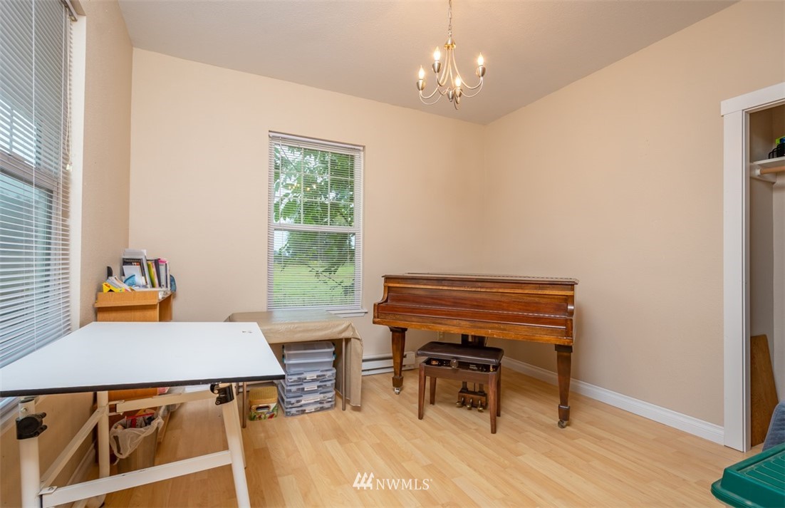 186 Leudinghaus Road Chehalis, WA 98532 - Photo 12 of 25 a view of a dining room with furniture window and wooden floor