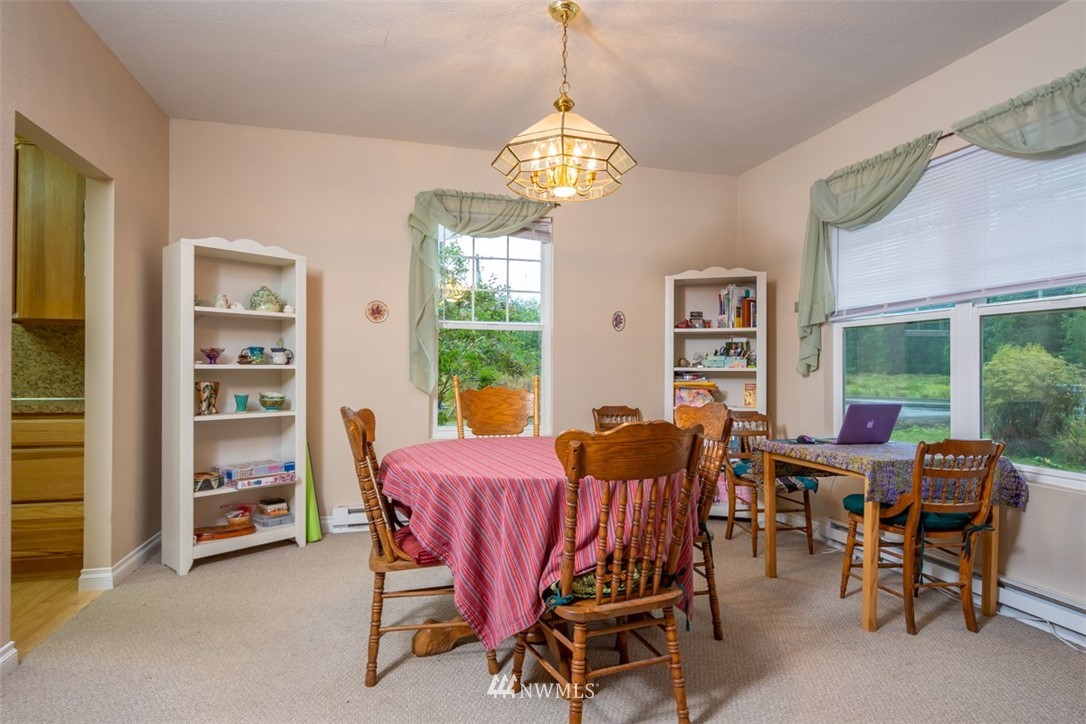 186 Leudinghaus Road Chehalis, WA 98532 - Photo 10 of 25 a view of a dining room with furniture window and outside view
