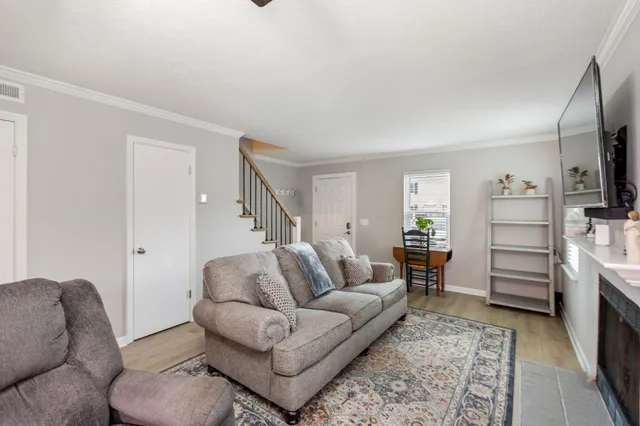 a living room with furniture and a couch