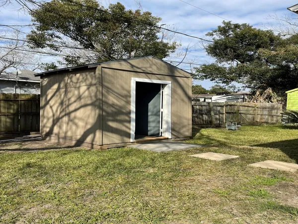 a backyard of a house with lots of green space
