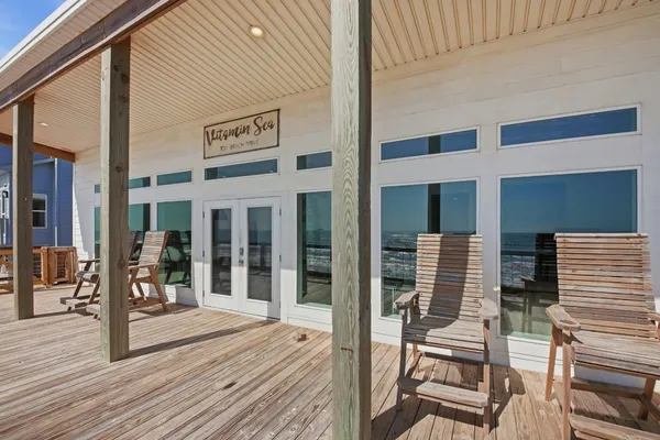 a view of a building with sitting area