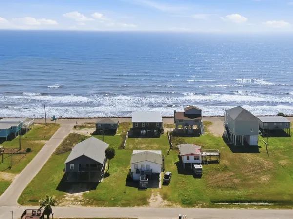 a view of a swimming pool with an ocean view