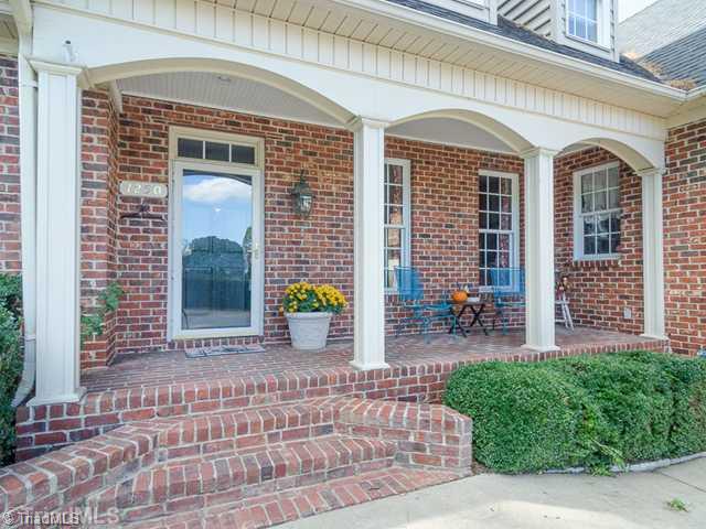 Exterior Front. Beautiful Brick and Stone Exterior With Covered Front Porch