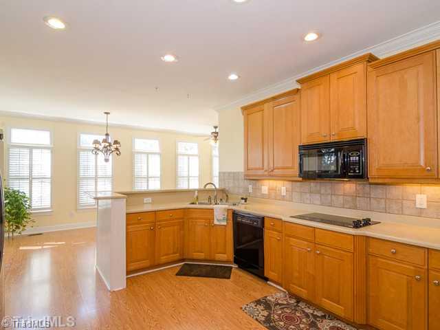 Kitchen. Kitchen Overlooks Incredible Backyard Living