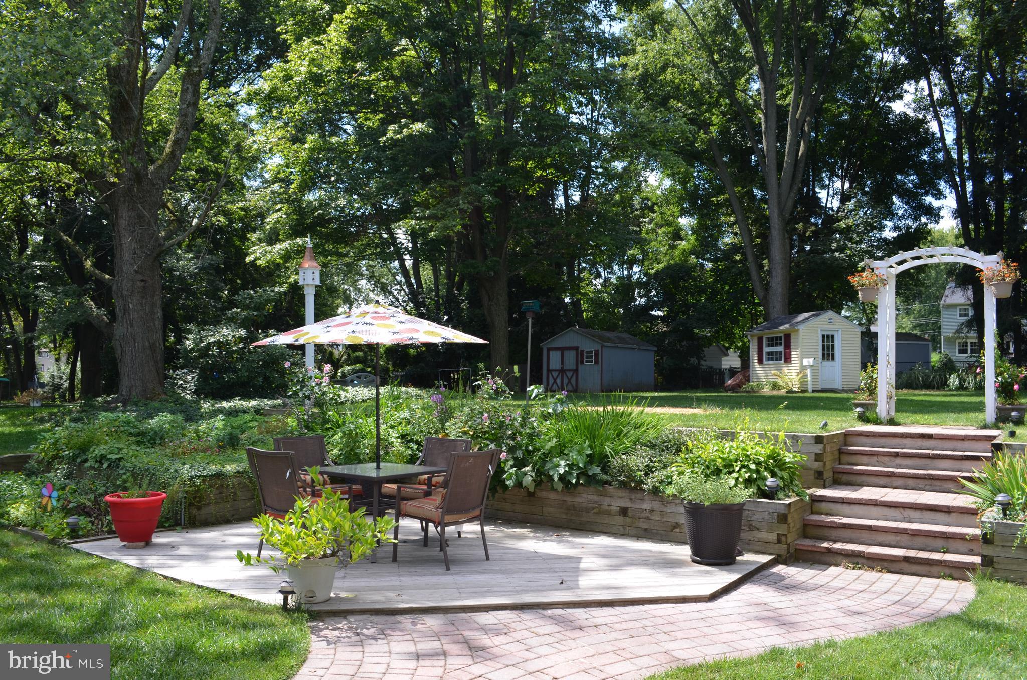 119 Princeton Road Exton, PA 19341 - Photo 26 of 33 Summer view of Deck and Yard