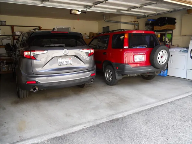 a swimming pool with outdoor seating and yard