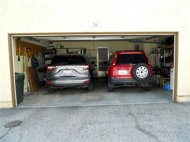 a view of a patio with a table chairs and a patio