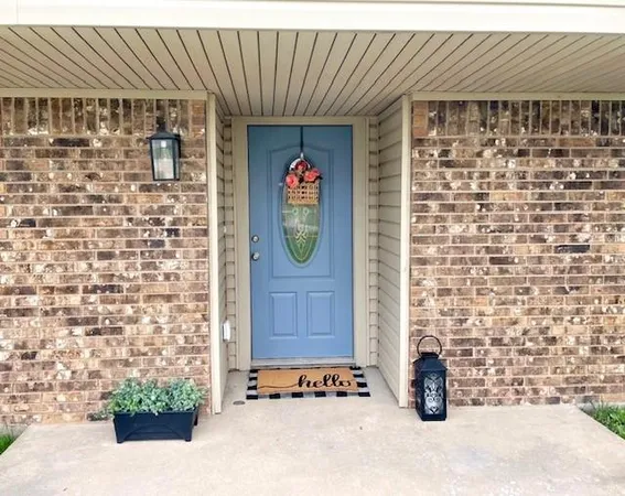 a front view of a house with outdoor space