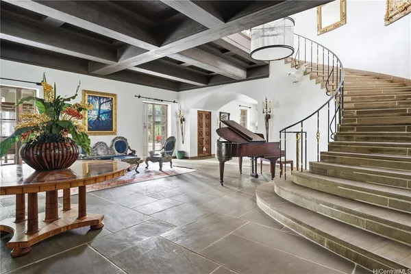 a view of entryway livingroom and hall