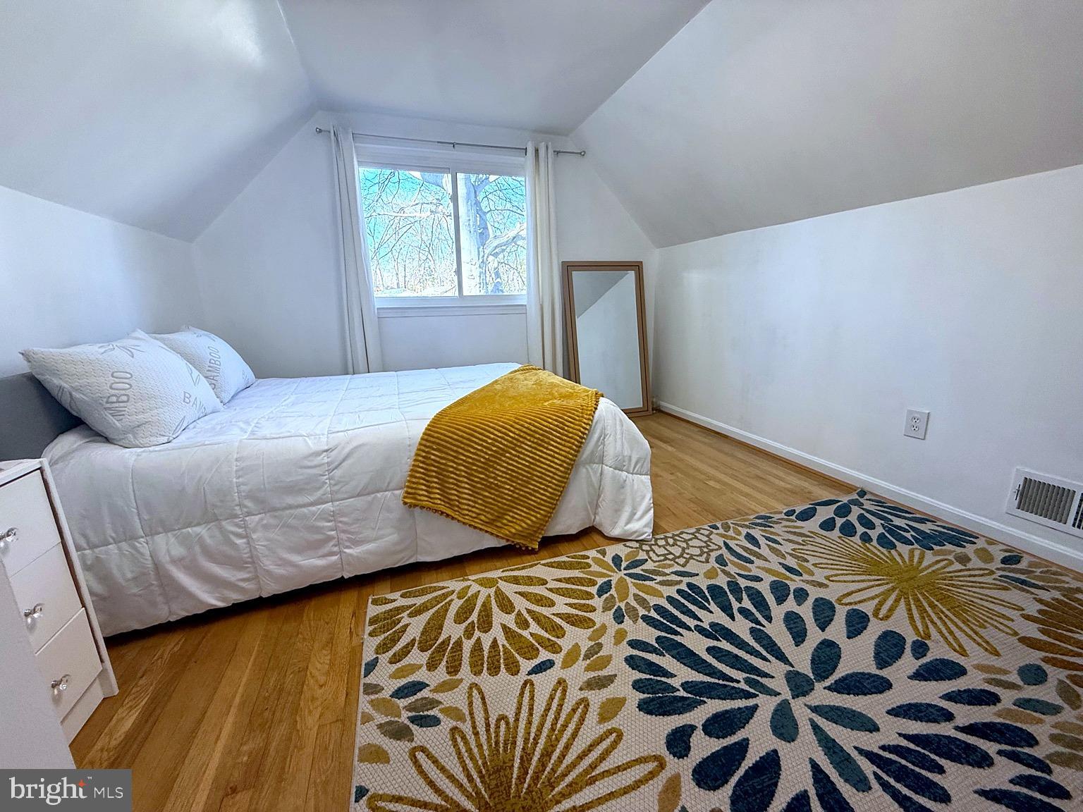8621 Kenilworth Drive Springfield, VA 22151 - Photo 12 of 21 a bedroom with a bed and a window