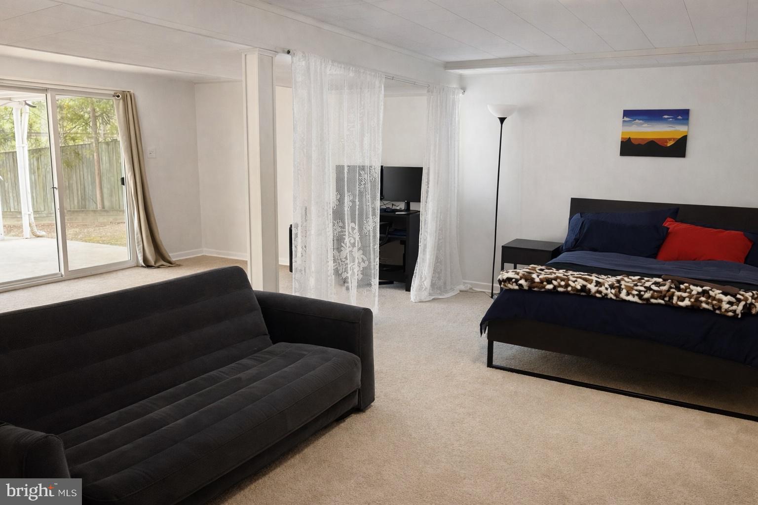8621 Kenilworth Drive Springfield, VA 22151 - Photo 19 of 21 a living room with furniture and a large window