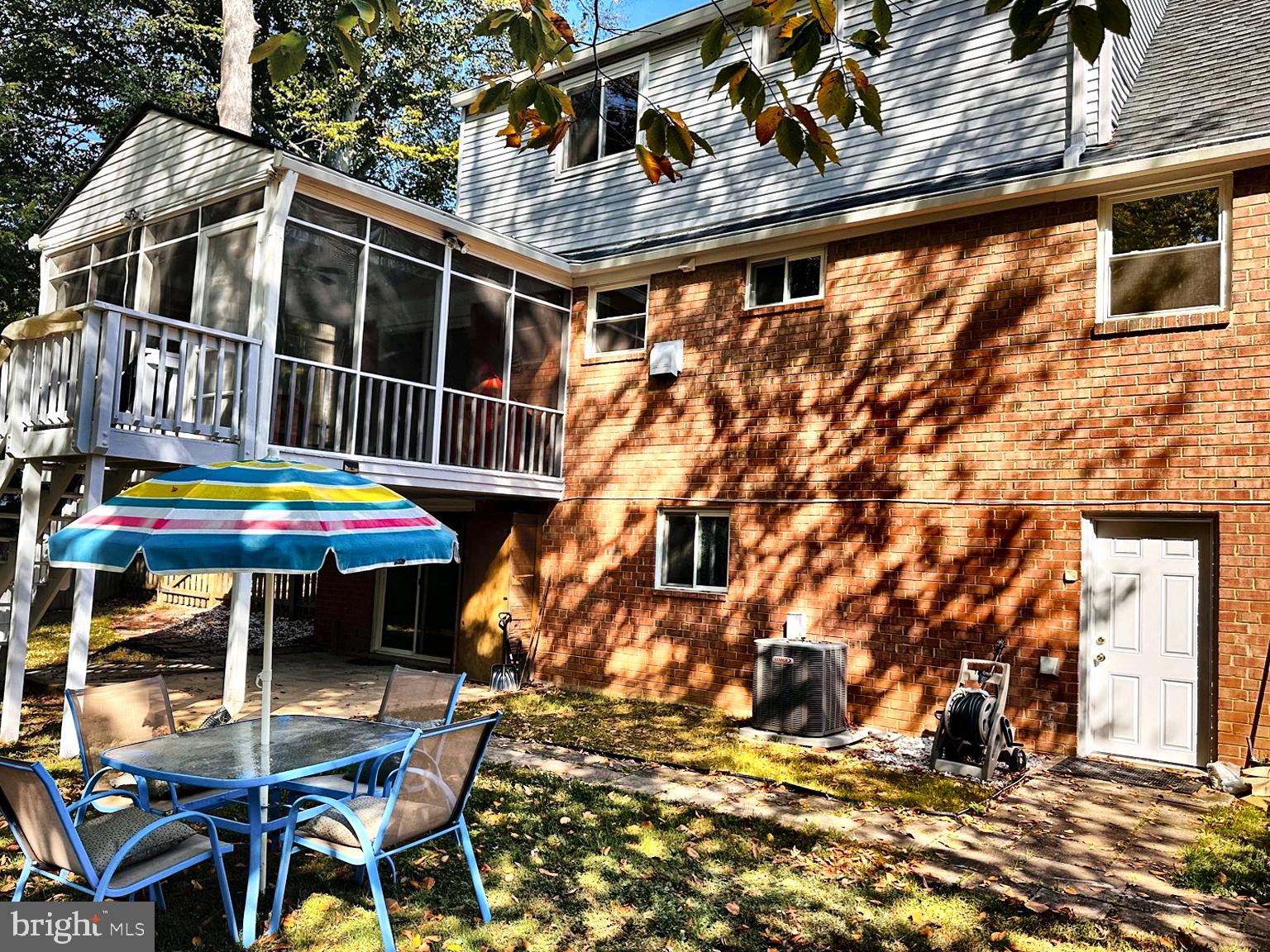 8621 Kenilworth Drive Springfield, VA 22151 - Photo 21 of 21 a backyard of a house with table and chairs