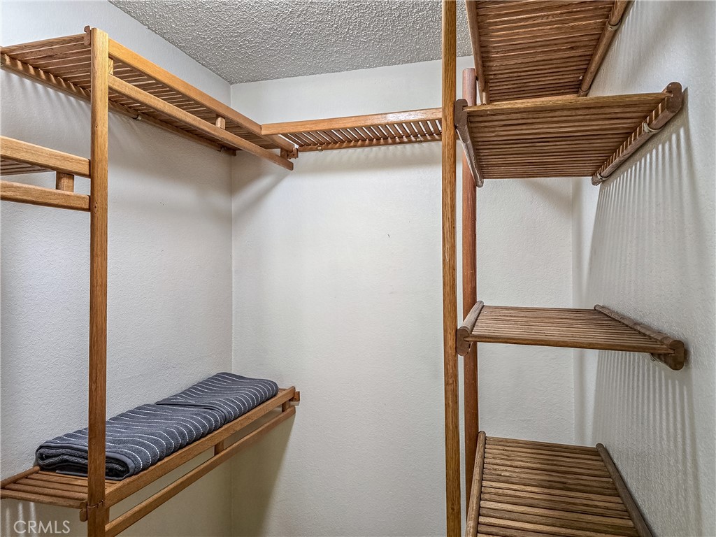 11357 Gramercy Place Riverside, CA 92505 - Photo 35 of 65 Walk-in closet in primary bedroom
