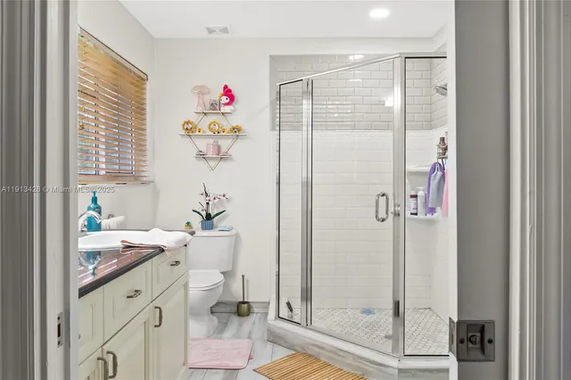 a very nice looking room with a bathroom