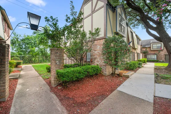 a front view of a house having yard