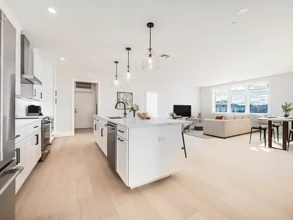 a view of living room with furniture and flat screen tv