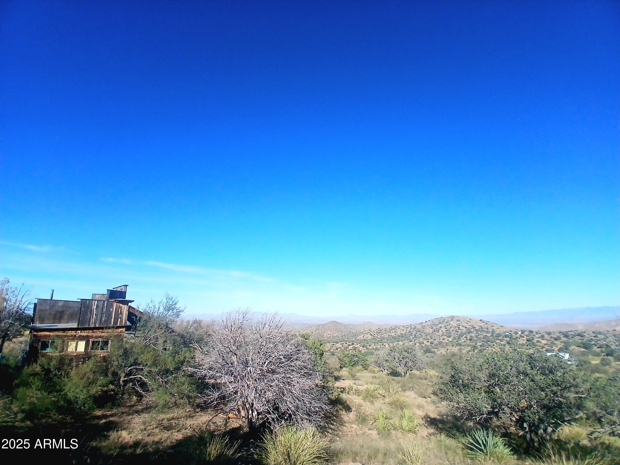 11699 North Last Chance Road Elfrida, AZ 85610 - Photo 3 of 39 an aerial view of a city