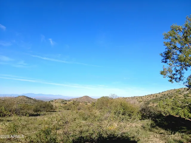a view of lake with mountain